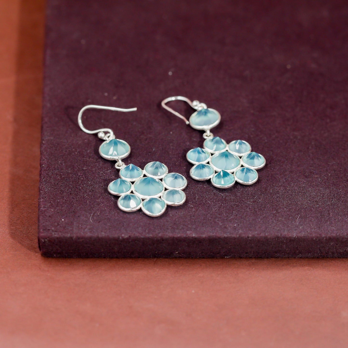 Radiant Silver Aqua Calci Flower Earrings