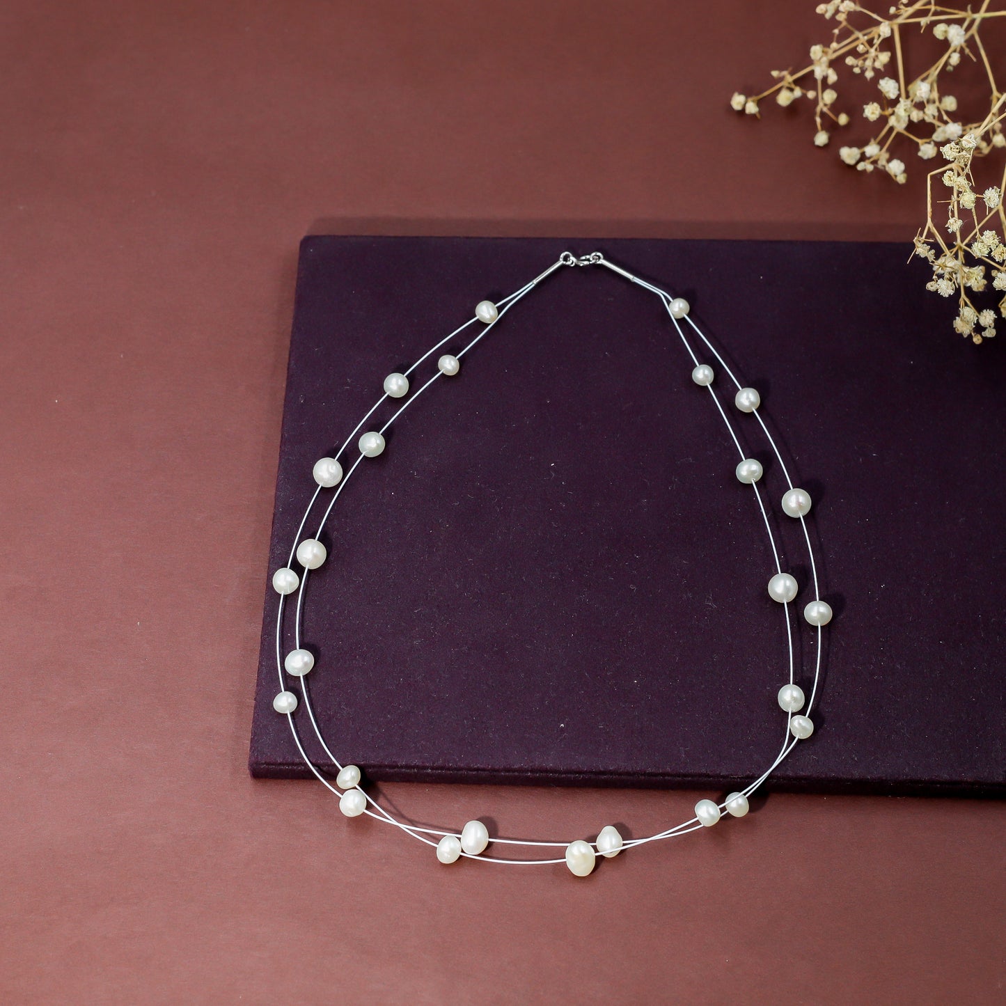 Elegant Two-Line Floating Pearl Necklace